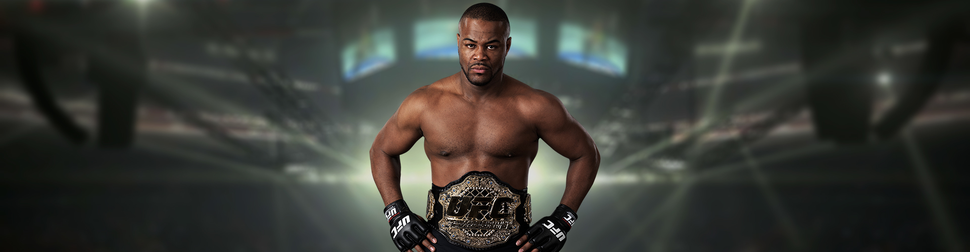 Rashad Evans with championship belt and hands on hips