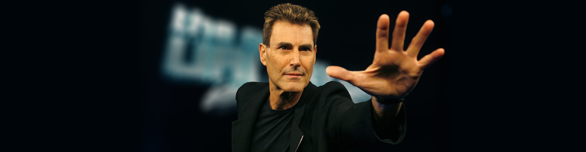 Uri Geller with hand outstreched
